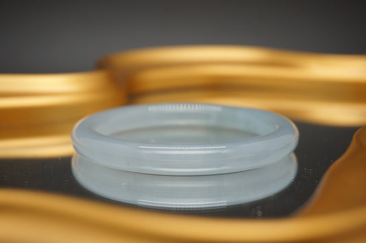 Luminous Skies Jade Bangle with Golden Accents 晴底洒金翡翠手镯