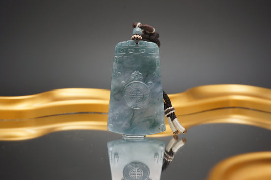 Antique-style plain pendant made from Wujī black jade 乌鸡仿古无事牌